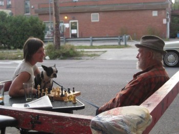 Poppa playing chess and counseling