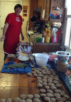 Rodger Doncaster baking 50 dozen cookies for distribution through the AIDS food bank